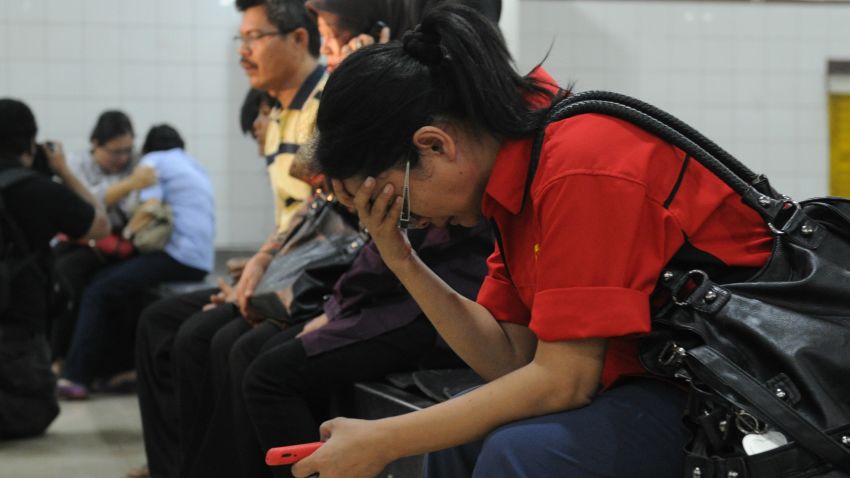 Relatives of passengers on the Russian Sukhoi Superjet 100 wait for news in Jakarta on May 9.