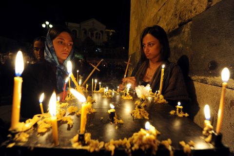 Nearly 84% of the population is Orthodox Christian. Christianity became the state religion around 330 AD.  Here, religious observors celebrate Easter at the Sion Cathedral in Tbilisi.