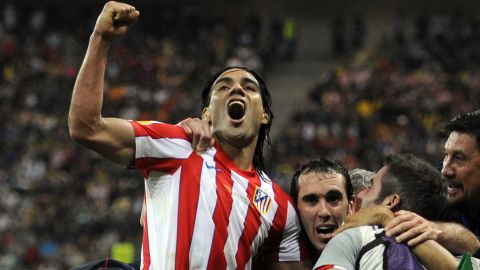 Colombian striker Falcao celebrates after his two goals hand Atletico Madrid victory in the Europa League final.