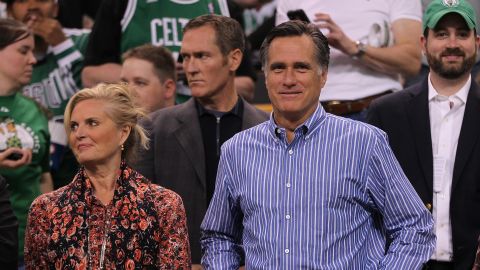 Republican presidential candidate Mitt Romney stands, with his wife Ann, before start of a game between Boston Celtics and the Atlanta Hawks 