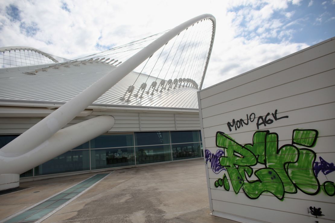 With graffiti apparent, the 2004 Olympic Games Complex appears in disrepair in February 2012 in Athens, Greece.