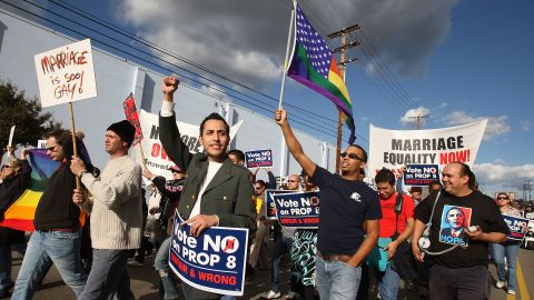 Supporters of same-sex marriage organized by Latino activists march in predominantly Latino neighborhoods in L.A. last year.
