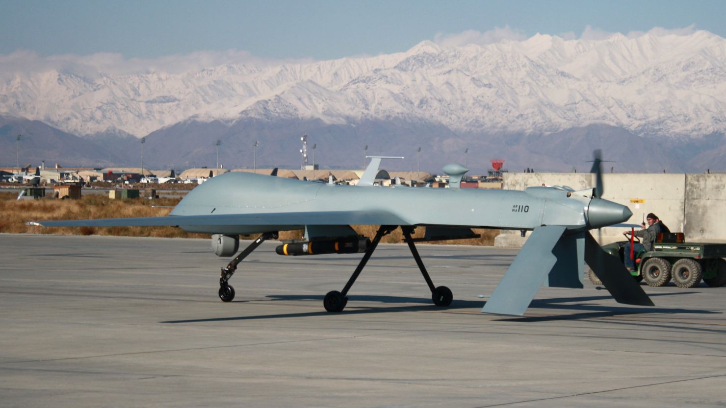 A U.S. Predator unmanned drone armed with a missile sets off from its hangar at Bagram Air Base on November 27, 2009.