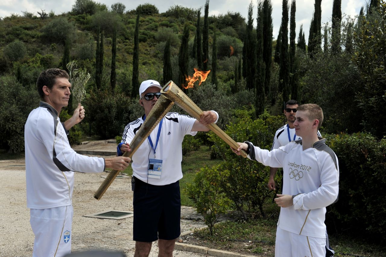 The Liverpool-born swimmer handed the torch to 19-year-old British boxer Alexander Loukos.