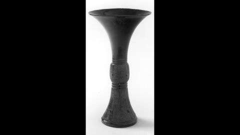 Chinese bronze beaker or Ku, A Chinese, Shang Dynasty, 1200-1100 B.C.ancient bronze beaker.