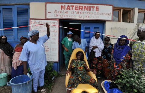 Lack of quality medical facilities is a reason behind the high maternal mortality rate in Africa. A pregnant woman arrives to give birth at a maternity ward run by Medecins Sans Frontier (Doctors Without Borders) on April 23, 2011 in the Abobo quarter of Abidjan, Ivory Coast. 