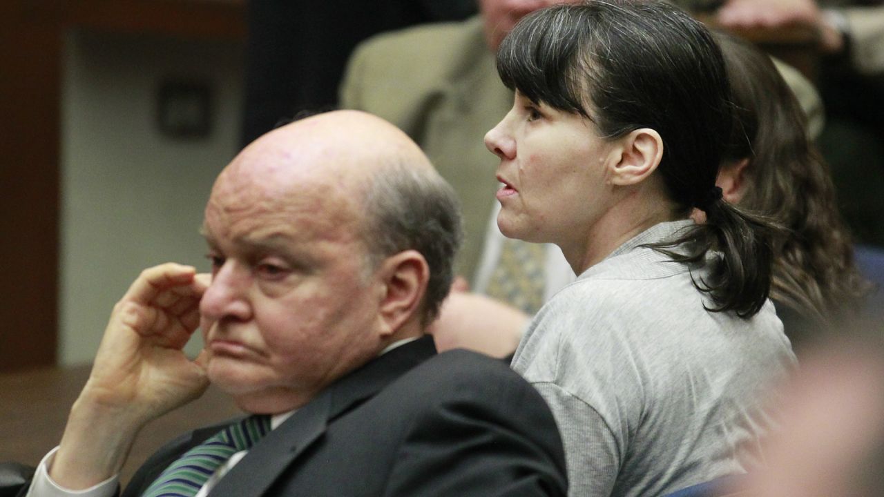 Attorney Mark Overland, left, and former Los Angeles police detective Stephanie Lazarus await the verdict.