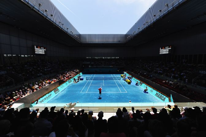 The blue clay court is made the same way as the red, with bricks ground into tiny fragments and spread over the ground in two different layers. However, in Madrid these bricks are stripped of their iron oxide (the chemical that provides the original color) and then treated with dye.