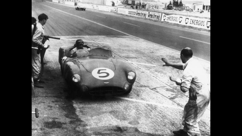 Shelby and Ray Salvadori's Aston Martin DBR1/300 stops at the pits during the 24 Hours of Le Mans in 1959. The car won the race by one lap.