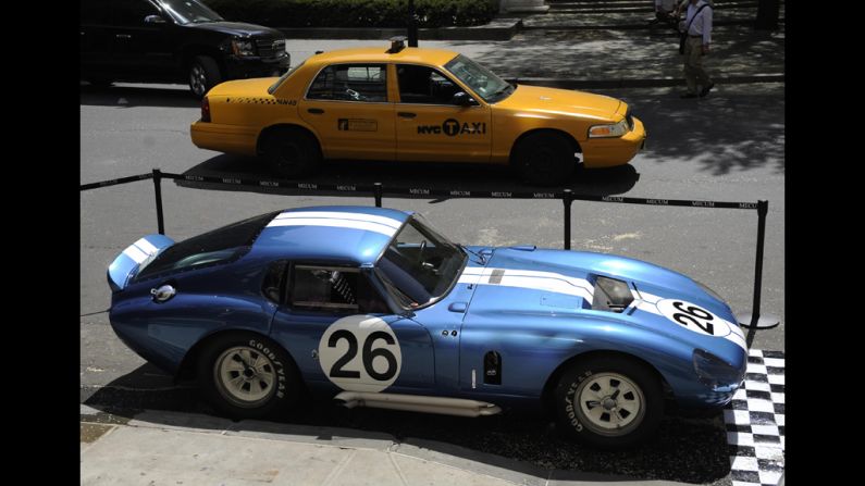 The 1965 Shelby Daytona Cobra Coupe CSX260 stands on display in front of New York's Plaza Hotel during an auction preview in 2009. The 1965 Shelby Daytona Cobra was one of six cars built by Carroll Shelby and the first American race car to beat Ferrari in the world manufacturers racing championship. The coupe sold for a record $7.25 million.