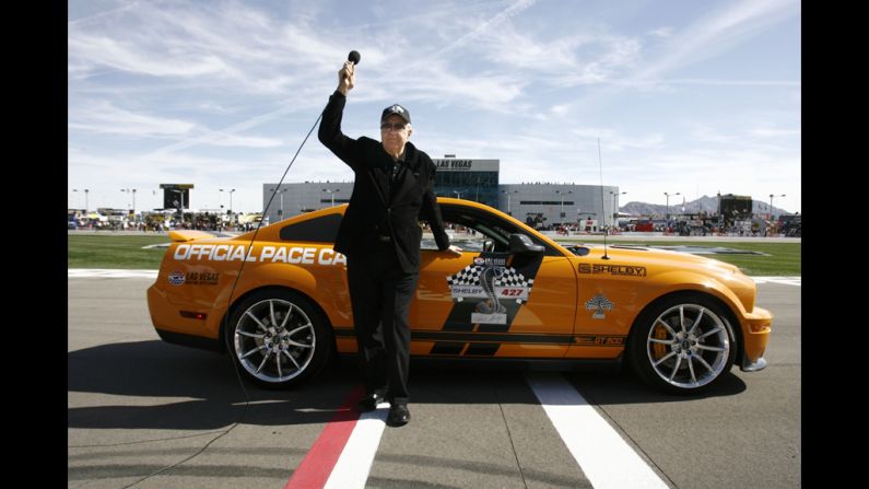 Grand Marshall Carol Shelby gives the "gentlemen, start your engines" call during the NASCAR Sprint Cup Series Shelby 427 at the Las Vegas Motor Speedway in 2009.