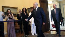 Greek President Karolos Papoulias arrives Sunday for a meeting with the leaders of Greece's top three political parties. 