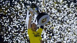 Real Madrid captain Iker Casillas lifts the Spanish Primera Division trophy after Jose Mourinho's team defeated Mallorca 4-1 on Sunday. The 32-time Spanish champions finished the season with 100 points, a record amount.