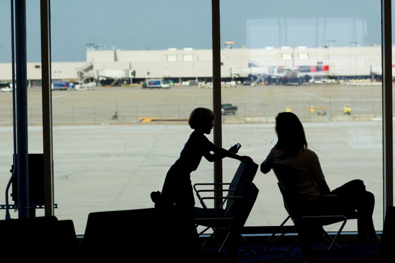 While there aren't any official viewing areas to watch planes take off and land, floor-to-ceiling windows allow for viewing all over the concourse. 