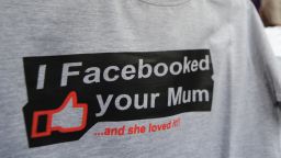 A T-shirt referencing the social networking site Facebook is seen on sale at a roadside stall in New Delhi on May 14, 2012.