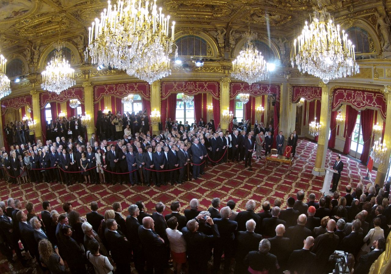 Hollande speaks during the handover ceremony at the Élysée Palace in Paris.
