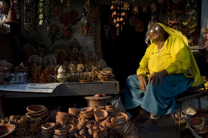 An Indian woman sells earthenware oil pots or "diyas" at a roadside stall in the run up to last year's Diwali Festival. Diyas are in heavy demand during the festival as they are used to hold lit oil lamps and decorate the interior and exterior of homes.