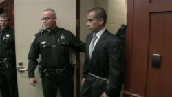 Zimmerman walking into court