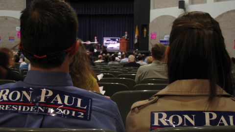 Two Ron Paul supporters sit in the back of Virginia's 8th Congressional District convention Saturday, waiting to vote for delegates to the national convention.