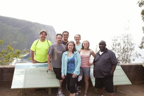 The Fit Nation "Lucky 7" arrives in Kailua-Kona, Hawaii, on Sunday, May 13, for a week of training. The group will be participating in the Nautica Malibu Triathlon with CNN's Dr. Sanjay Gupta in September. Here they take a group picture before hiking down the Waipio Valley Trail.