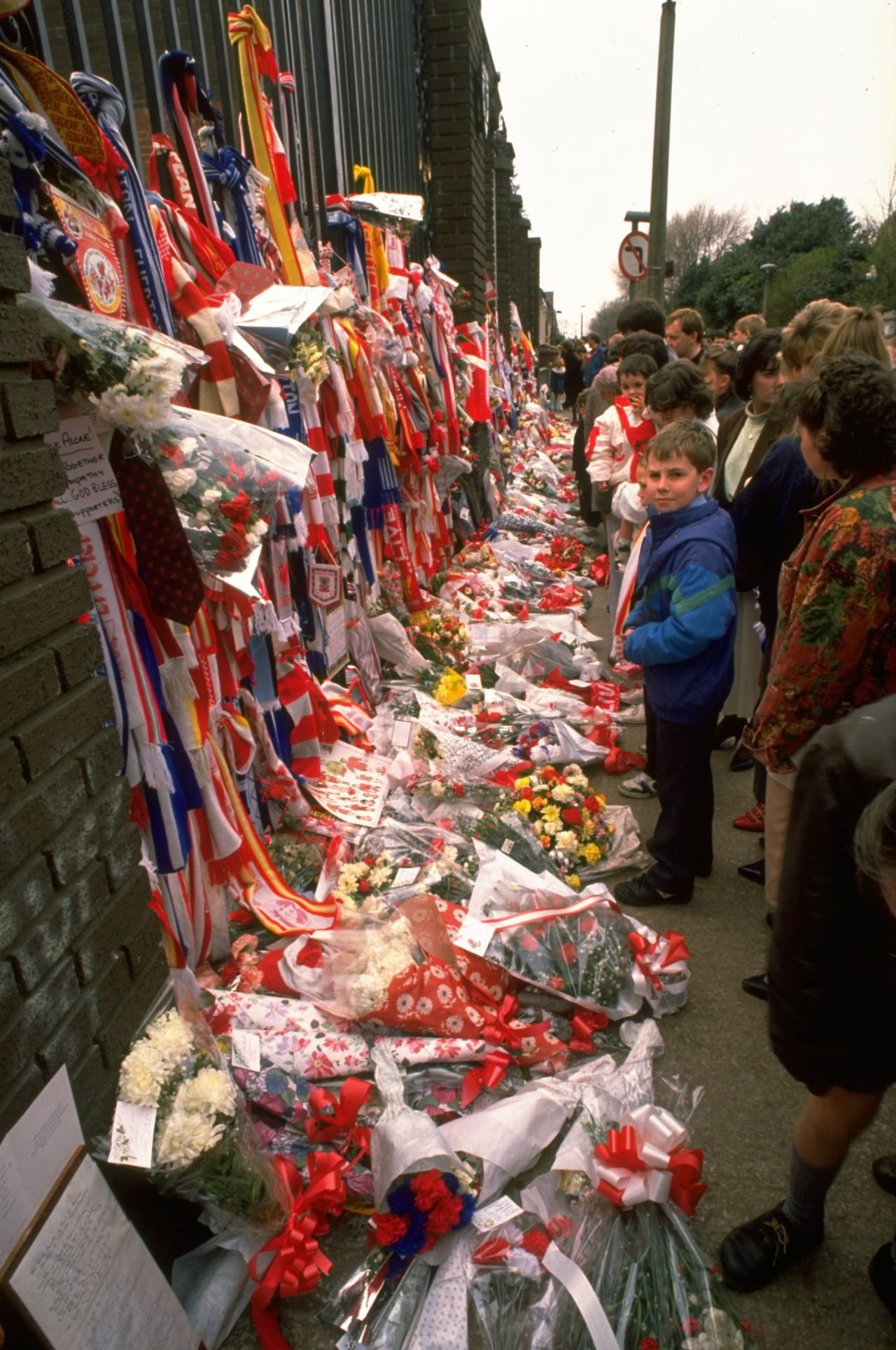In the immediate aftermath, people from throughout Britain left tributes at Liverpool's Anfield stadium.