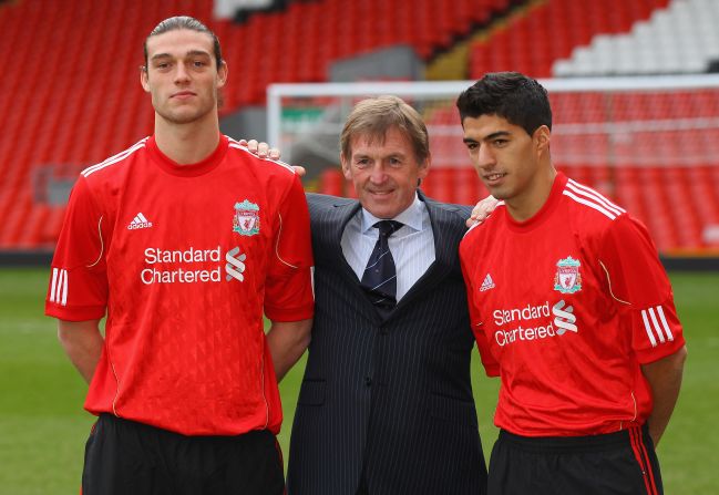 Dalglish spent heavily on his return to management, splashing out on players such as Luis Suarez (R), Stewart Downing and Jordan Henderson. His most eye-catching piece of business was the signing of striker Andy Carroll (L) from Newcastle United for a British record transfer fee.