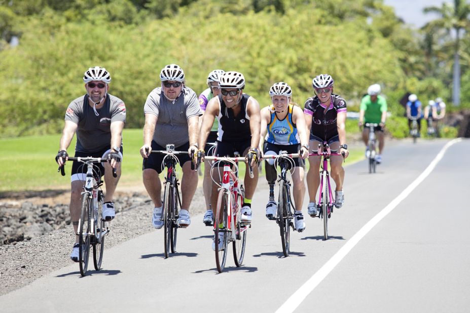 The Fit Nation participants head off for a bike ride along the "Queen K" highway in Hawaii. 