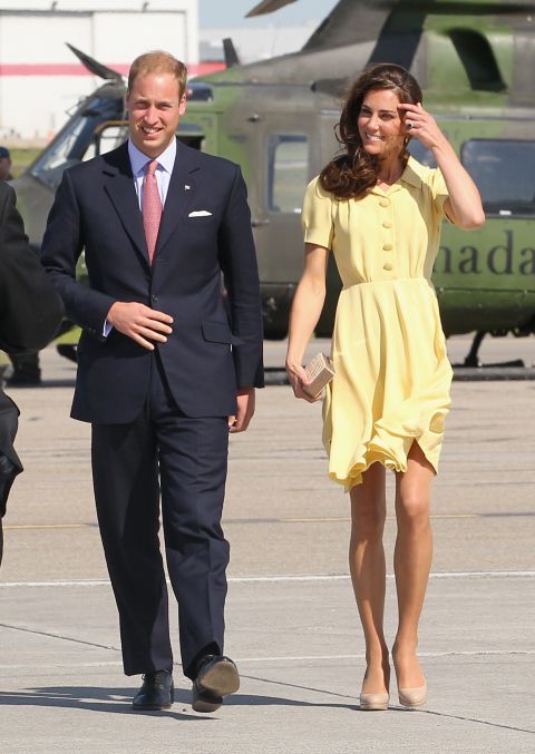 Kate almost had a wardrobe malfunction when the pair arrived in Calgary that day. The skirt of her canary yellow Jenny Packham dress kept blowing up in the wind.