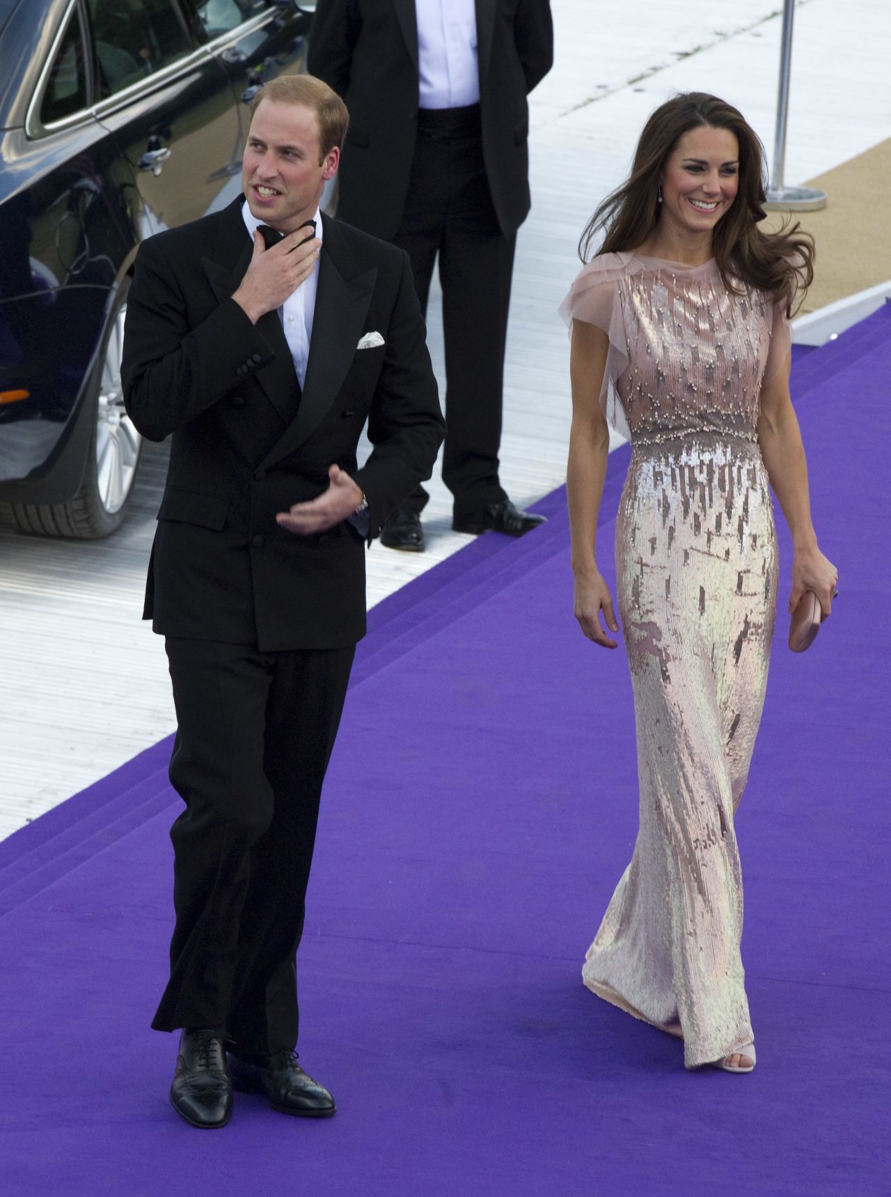 Stepping out in another Jenny Packham gown, Kate attends a gala at London's Kensington Palace with William on June 9 2011.