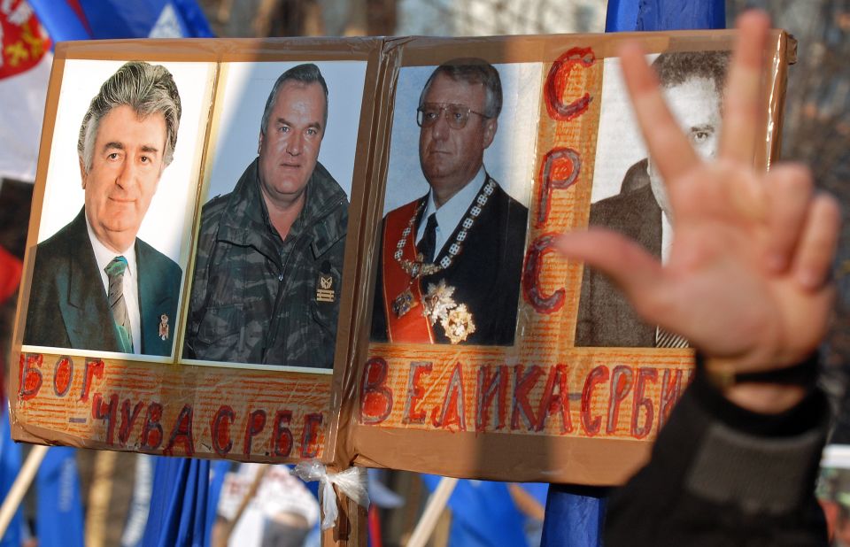 Serb nationalists protest against the U.S. and the U.N. war crimes court in Belgrade in December 2006. Their posters show pictures of Karadzic, Mladic and Vojislav Seselj with the Cyrillic writing meaning: "God saves the Serbs" and "Great Serbia."