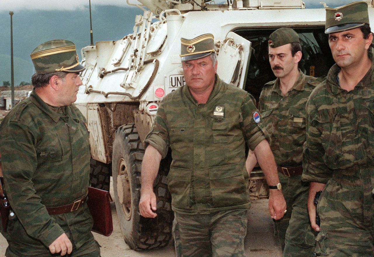 General Ratko Mladic, center, commander of Serbian forces in Bosnia, arrives at Sarajevo airport on August 10, 1993 to negotiate the withdrawal of his troops from Mount Igman.