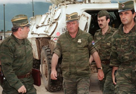 General Ratko Mladic, center, commander of Serbian forces in Bosnia, arrives at Sarajevo airport on August 10, 1993 to negotiate the withdrawal of his troops from Mount Igman.