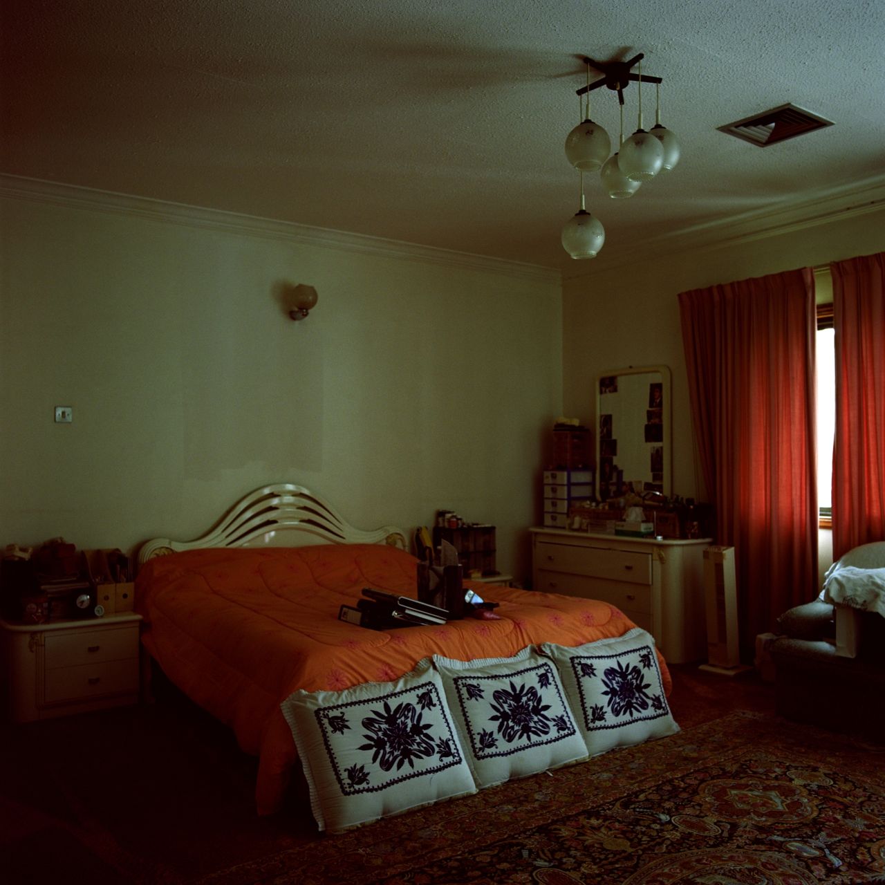 "The Orange Room" is from Lamya Gargash's "Presence Series." Her photographs document the forgotten public and private spaces of her native Emirati society.