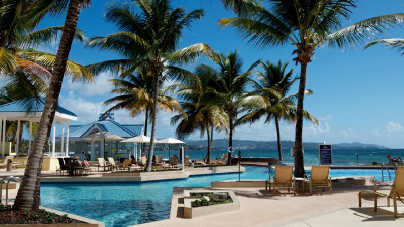 The Magdalena Grand Beach Resort in Tobago may be surrounded by a gated, luxury community of golf courses and vacation homes, but the nature trails and mangrove forests shelter guests' rooms.