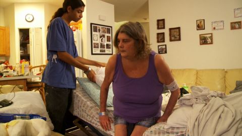 Connie Siskowski's nonprofit helps young caregivers such as Nickolaus Dent, left.