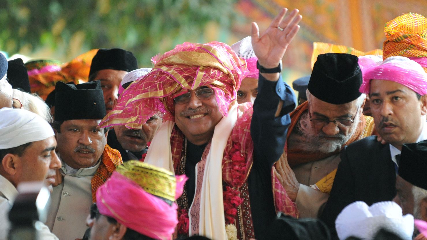 File photo of President Asif Ali Zardari, center, on  April 8, 2012 during a visit to India.