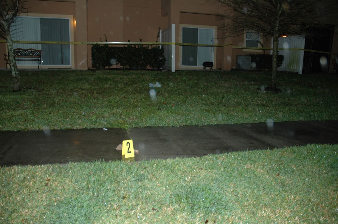 Evidence marker 2 shows a plastic sack found at the crime scene.