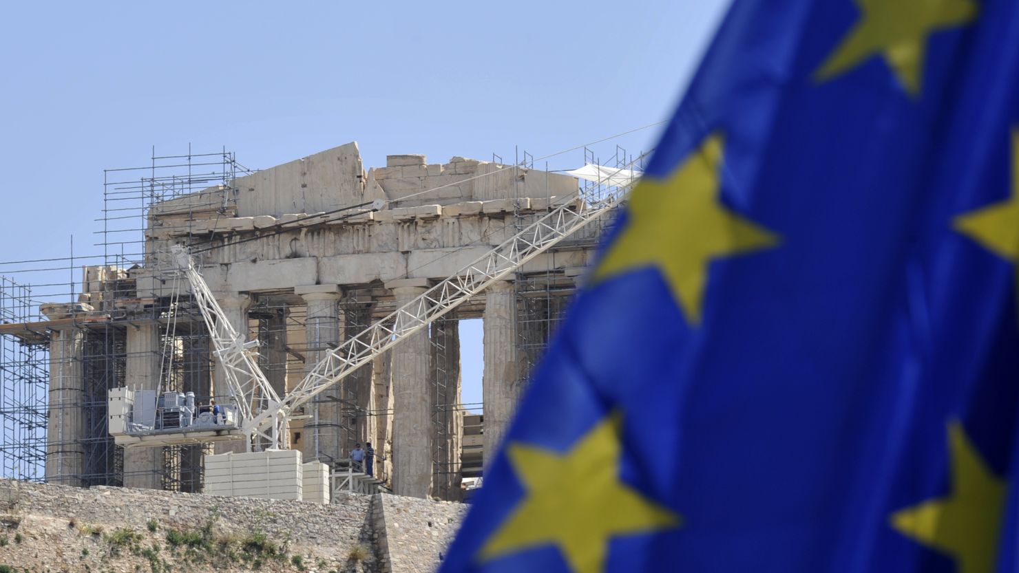 An EU flag flies in front of the Acropolis in Athens. A rerun of the Greek elections is scheduled for June 17.