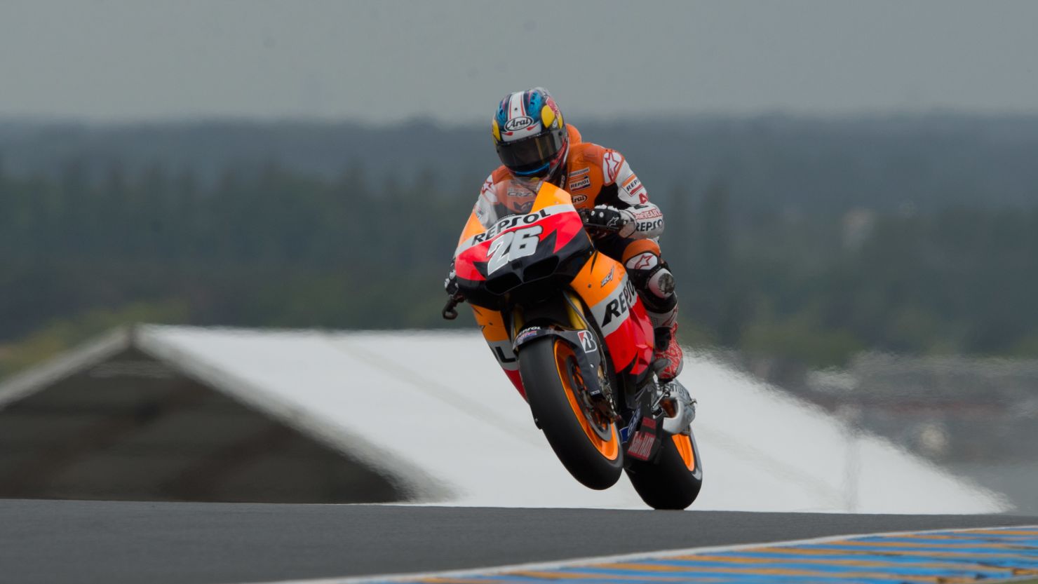 Dani Pedrosa lifts the front wheel of his Repsol Honda during Saturday's MotoGP qualifying action at Le Mans.