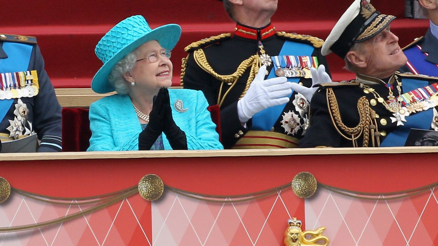 Queen Elizabeth II and Prince Philip watch the flypast in Windsor on Saturday.