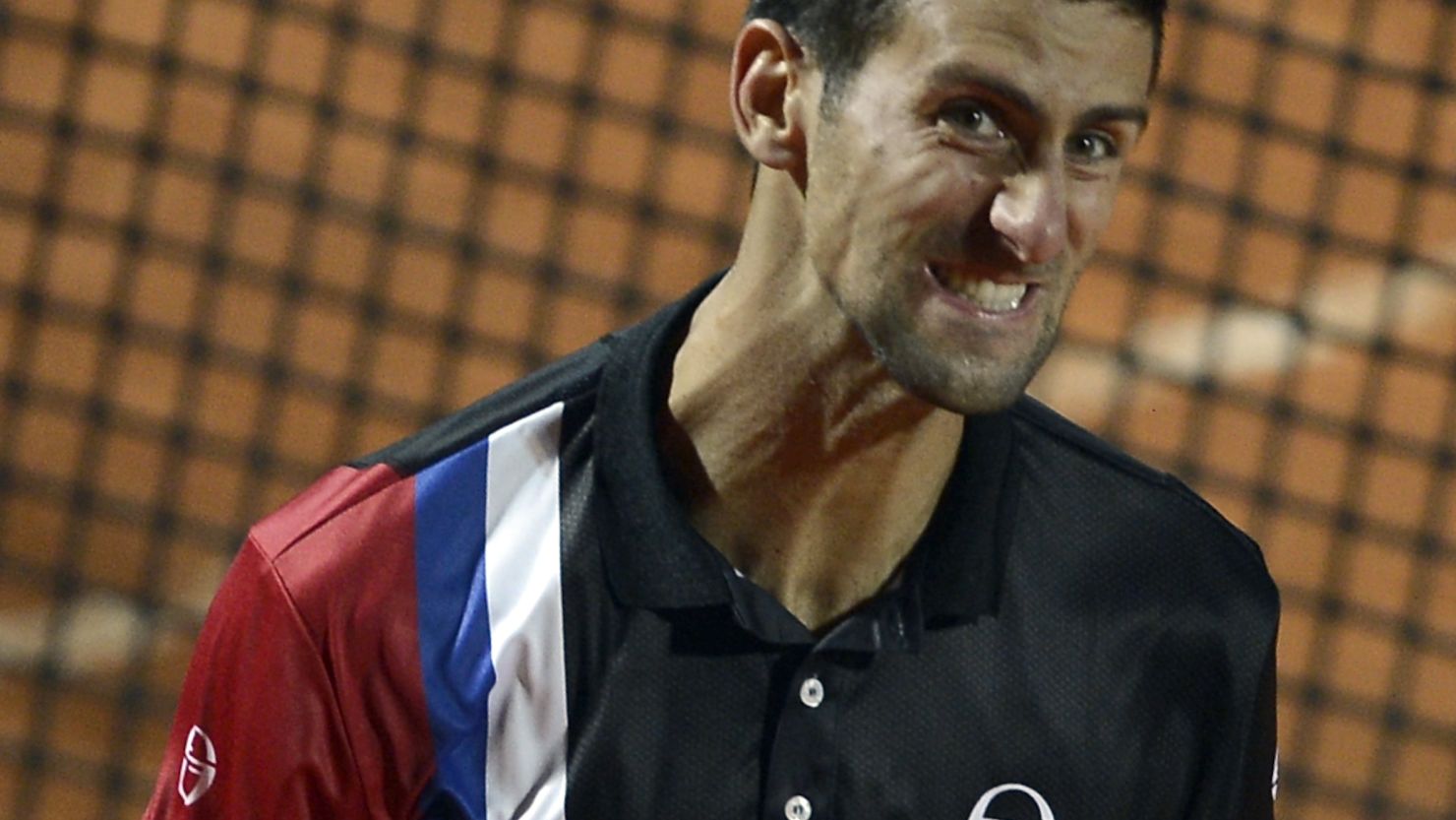Novak Djokovic celebrates his semifinal win over Roger Federer in the Rome Masters.
