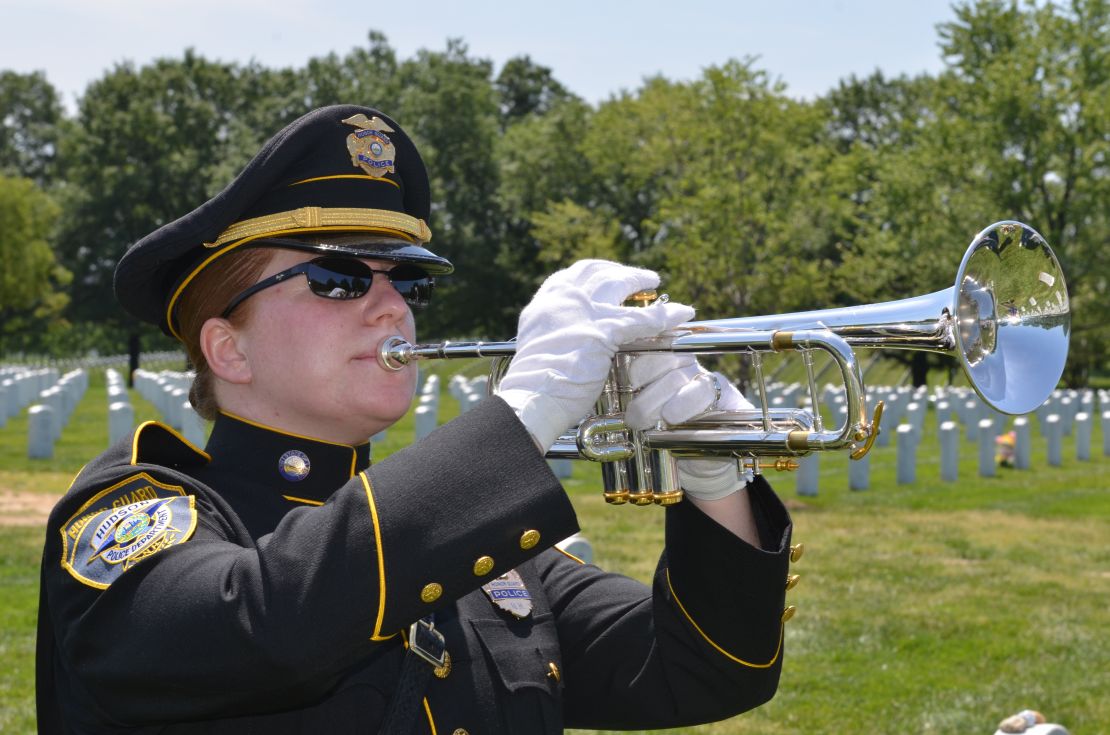 Allison Cummings, a patrol officer from Hudson, New Hampshire, says playing taps at Arlington National Cemetery was like playing at Carnegie Hall.