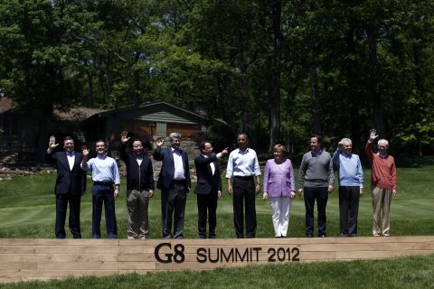 The 10 members of the G8 Summit pose for a group portait at Camp David, Maryland.  Left to right: European Commission President Jose Manuel Barroso, Russian Prime Minister Dmitry Medvedev, Japanese PM Yoshihiko Noda, Canadian PM Stephen Harper, French President Francois Hollande, U.S. President Barack Obama, German Chancellor Angela Merkel, British PM David Cameron, Italian PM Mario Monti and European Council President Herman Van Rompuy.