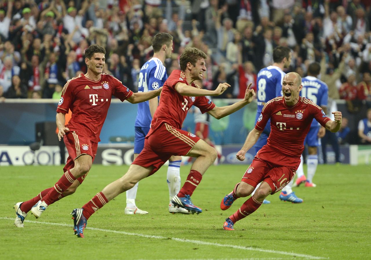 Thomas Mueller celebrates his opening goal for Bayern Munich with just seven minutes remaining.