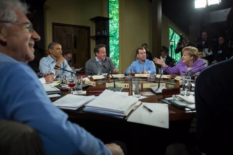From left, Monti, Obama, Cameron, Medvedev and Merkel discuss issues during the first working session of the 2012 G8 summit at Camp David in Maryland.