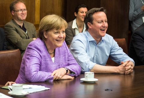 Merkel and Cameron watch the UEFA Champions League Final between FC Bayern Muenchen and Chelsea FC during the G8 Summit.