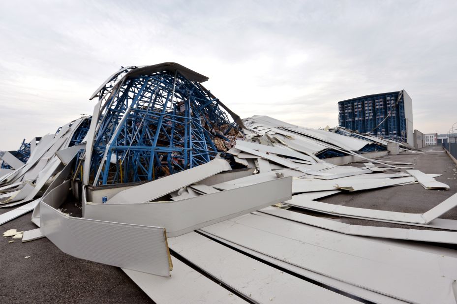 The roof of a ceramics factory is left damaged by the powerful earthquake that shook Sant'Agostino village.