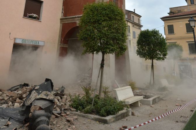 Smoke rises from a building in San Felice sul Panaro.