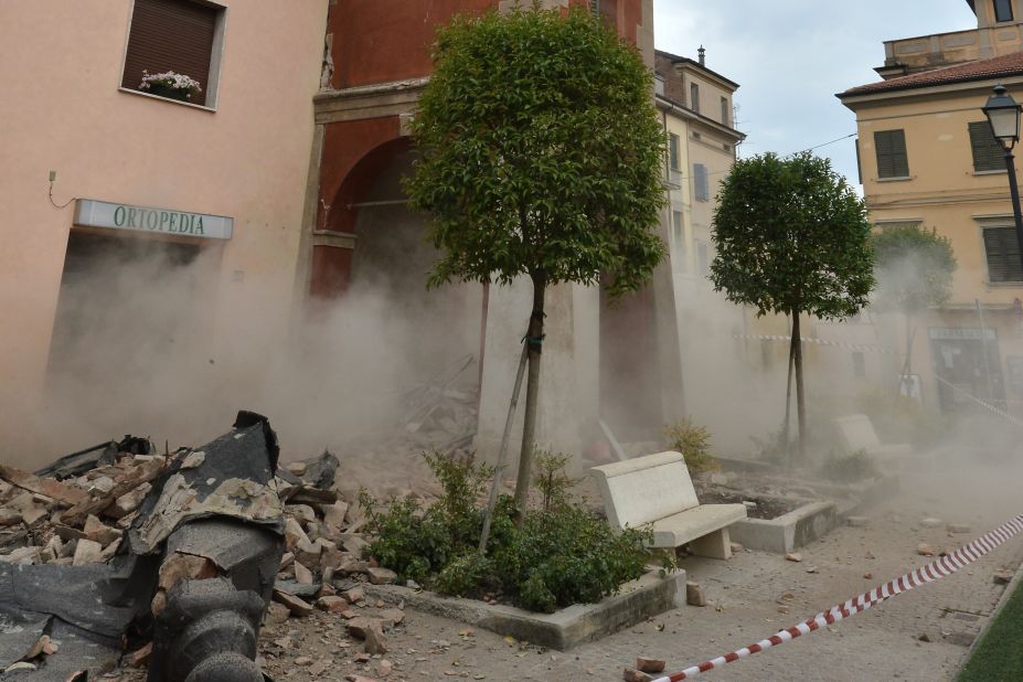 Smoke rises from a building in San Felice sul Panaro.