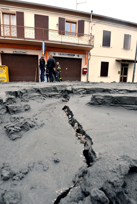 The central street of San Carlo village is damaged following the powerful earthquake.